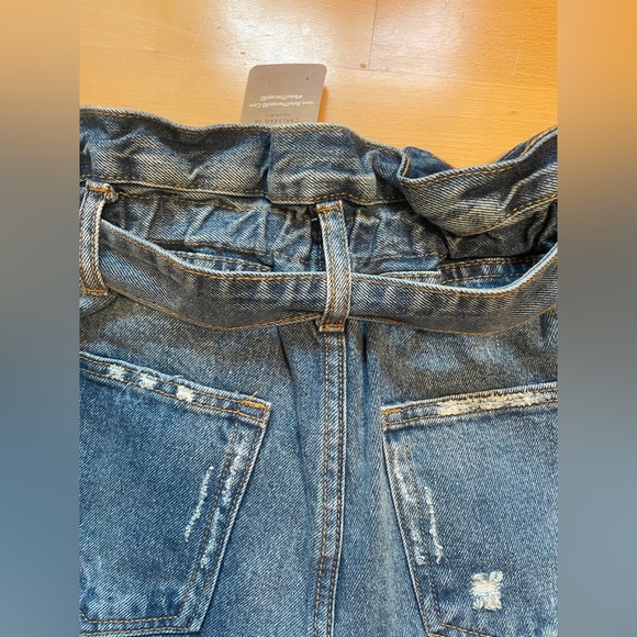 Janette high wasted distressed jean shorts. New with tags. Size medium. - Picture 8 of 10